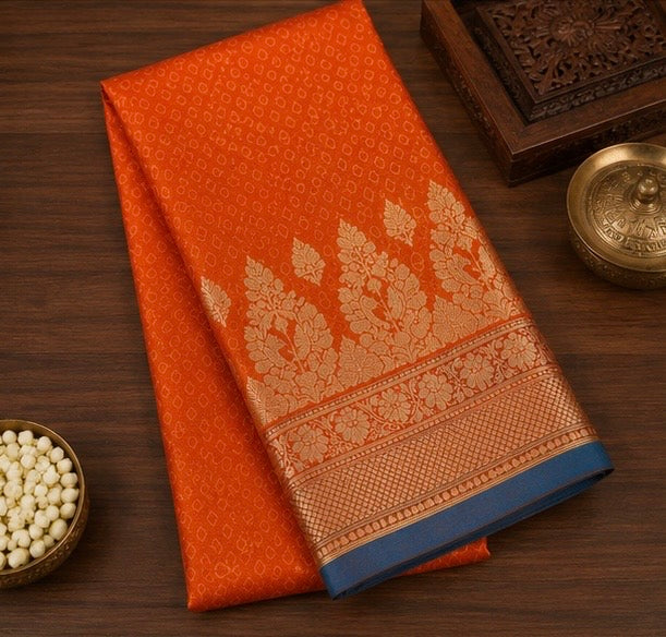 Vibrant Orange Silk Woven Saree with Blue Edge & Gold Zari