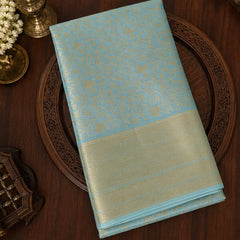 Trisha Mam Inspired Sky Blue & Gold Floral Brocade Soft Silk Saree with Rich Zari Border