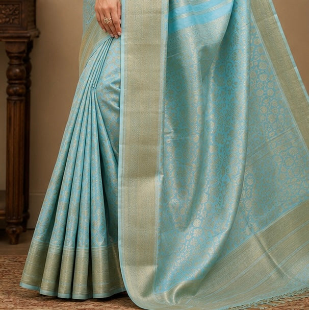 Trisha Mam Inspired Sky Blue & Gold Floral Brocade Soft Silk Saree with Rich Zari Border