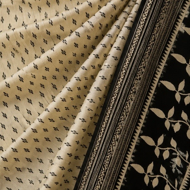 Off White Printed Saree with Black Traditional Border