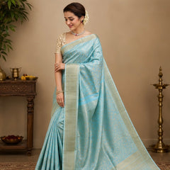 Trisha Mam Inspired Sky Blue & Gold Floral Brocade Soft Silk Saree with Rich Zari Border