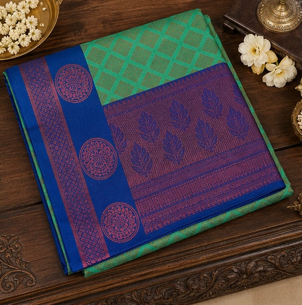 Turquoise Green Woven Silk Saree with Royal Blue Brocade Border