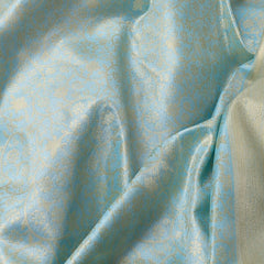 Trisha Mam Inspired Sky Blue & Gold Floral Brocade Soft Silk Saree with Rich Zari Border