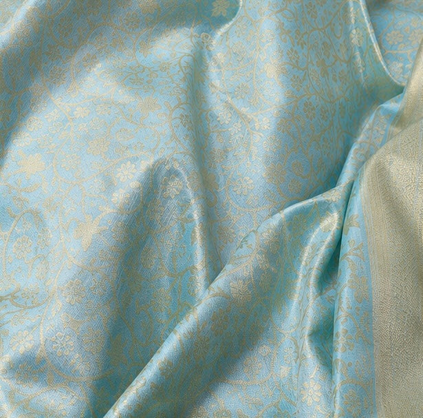 Trisha Mam Inspired Sky Blue & Gold Floral Brocade Soft Silk Saree with Rich Zari Border