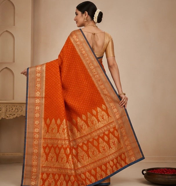 Vibrant Orange Silk Woven Saree with Blue Edge & Gold Zari