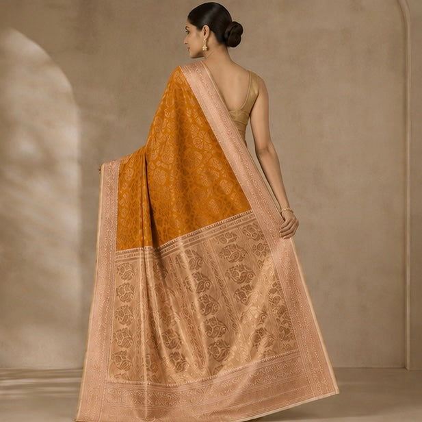 Orange Floral Woven Silk Saree with Zari Border