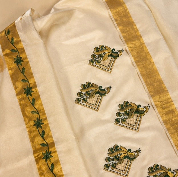 Off White Cotton Saree with Green Floral Zari Border & Peacock Butta Design