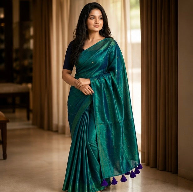 Teal Green Zari Butti Tissue Silk Saree with Purple Tassels