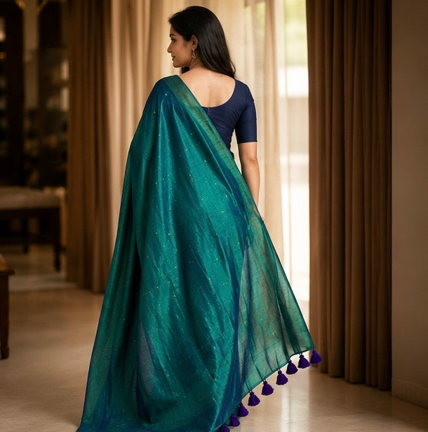 Teal Green Zari Butti Tissue Silk Saree with Purple Tassels